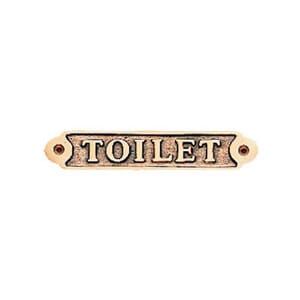 Skilt Toilet